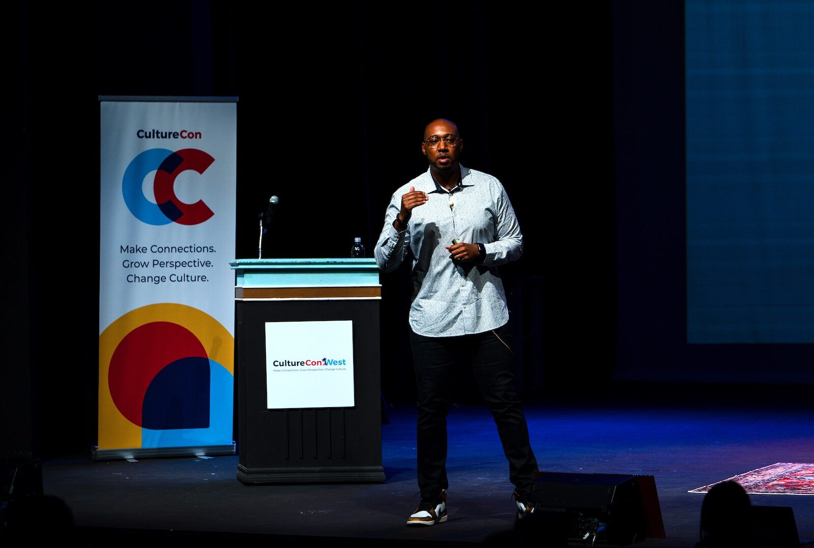 Willie Jackson on stage delivering a keynote address